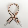 Detail of adjustable canvas bag strap with pink and brown geometric jacquard and silver hooks - Pattern Style 1 (Silver Hook)