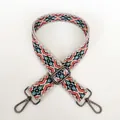 Detailed view of ethnic geometric woven strap No.9 with gunmetal swivel snap hooks - No.9 + Gunmetal Hook