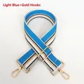 Detail of light blue striped 5cm wide adjustable strap with premium gold metal hooks - Light Blue + Gold Hook