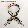 Detail of leopard print bag strap with gunmetal lobster clasp and adjustable buckle - Black White Gold Leopard + Gunmetal Hook