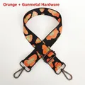 Detail view of orange and gold leopard pattern webbing with gunmetal swivel hooks - Orange Black Gold Leopard + Gunmetal Hook