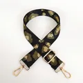 Detail of green leopard woven strap with gold metal lobster clasps and slider buckle - Green Black Gold Leopard + Gold Hook