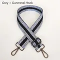 Detail view of grey patterned shoulder strap with gunmetal hooks and adjustable buckle - Grey + Gunmetal Hook