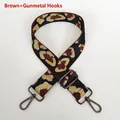 Detail of adjustable leopard print bag strap with coffee webbing and gunmetal metal hooks - Coffee Black Gold Leopard + Gunmetal Hook
