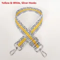 Close-up of adjustable yellow and white polka dot woven strap with silver metal hooks - Yellow White + Silver Hook