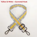Close-up of adjustable woven shoulder strap with black dots and yellow stripes detail - Yellow White + Gunmetal Hook