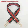 Detail of adjustable black and orange woven bag strap with white dots and gold hooks - Black & Orange with Gold Hook