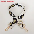 Close-up of leopard print shoulder strap with adjustable gold hooks for crossbody bags - White + Gold Hook