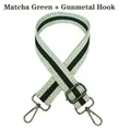 Close-up of adjustable matcha green polka dot bag strap with gunmetal swivel hooks - Matcha Green + Gunmetal Hook