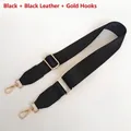 Close-up of adjustable black nylon bag strap with leather ends and gold metal hooks - Black Stripe with Black Leather and Gold Hook