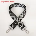 Detail of grey leopard print bag strap with silver metallic threads and swivel hooks - Grey + Silver Hook