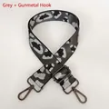 Detail of adjustable leopard print bag strap with grey metallic weave and gunmetal hooks - Grey + Gunmetal Hook