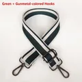 Detail of green and beige striped wide woven strap with gunmetal swivel hooks - Green + Gunmetal Hook