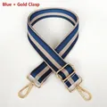 Close-up of thick blue and beige striped bag strap with gold metal hooks and buckle - Blue + Gold Hook