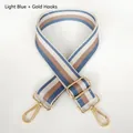 Detail of adjustable thick striped strap in light blue and brown with gold hooks - Light Blue + Gold Hook