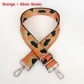 Detail of adjustable orange leopard print bag strap with silver metal swivel hooks - Orange + Silver Hook
