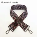 Close-up of leopard print shoulder strap with adjustable gunmetal buckle and swivel hooks - No.9 + Gunmetal Hook