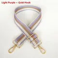 Close-up of adjustable striped bag strap with gold metal lobster hooks and slider - Light Purple + Gold Hook