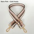 Detailed view of thick colorful striped wide shoulder strap with gold swivel hooks - Retro Pink + Gold Hook