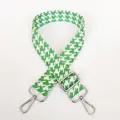 Detail view of houndstooth bag strap in green and white with silver metal swivel hooks - Green + Silver Hook