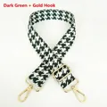 Detail of adjustable dark green houndstooth woven shoulder strap with gold swivel hooks - Dark Green + Gold Hook