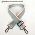 Close-up of green and coffee striped canvas strap with adjustable gunmetal metal hooks - Light Green + Gunmetal Hook