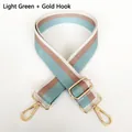 Detail of adjustable light green striped woven strap with gold metal swivel hooks - Light Green + Gold Hook