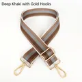 Detail of adjustable dark khaki striped nylon shoulder strap with gold swivel snap hooks - Dark Khaki + Gold Hook