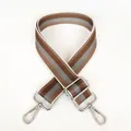 Detail of adjustable khaki and brown striped nylon shoulder strap with silver metal hooks - Dark Khaki + Silver Hook