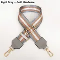 Detail of light grey nylon bag strap with gold lobster clasps and rose gold silk stripes - Light Gray + Gold Hook