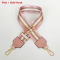 Detailed view of adjustable pink and gold striped nylon bag strap with metal hooks - Pink + Gold Hook