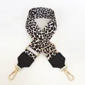Close-up of adjustable leopard print bag strap with golden metal carabiners - Gold / Black and Brown Leopard (5号)