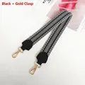 Dettaglio tracolla in tela geometrica bianca e nera con ganci dorati e pelle nera - Nero + Gancio Dorato