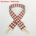 Detail of dark brown houndstooth canvas bag strap with golden metal swivel hooks - Dark Brown + Gold Hook