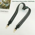 Detail view of 3.8cm wide green woven shoulder strap with gold hooks and leather ends - 3.8cm / Green + Green (Silver Hook)