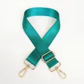 Detail of light green nylon shoulder strap with polished gold-tone metal lobster clasps - Light Green
