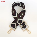 Close-up of geometric jacquard bag strap with golden metal clips and adjuster - Jacquard Diamond Style (A144)