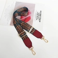 Detail of bohemian woven wide bag strap with red leather ends and gold metal buckles - Glass Flower Burgundy Leather