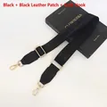 Adjustable black nylon shoulder strap with gold metal hooks and leather reinforcements - Black + Black Leather