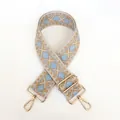 Close-up of adjustable canvas strap with blue geometric jacquard and gold metal hooks - Pattern B4 + Gold Hardware