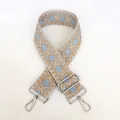 Detail view of thickened canvas strap with silver metal swivel hooks and blue geometric patterns - Pattern B4 + Silver Hardware