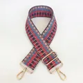 Macro detail of the colorful geometric woven bag strap with polished gold-tone metal buckles - Red Blue Black Beige Block (B41+Gold Hook)