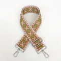Close-up of ethnic geometric pattern jacquard woven strap with silver metal buckles - Pattern B7 + Silver Hardware