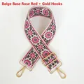 Détail de la broderie ethnique avec fleurs rouge rose et crochets métalliques dorés - Base Crème Rose Rouge