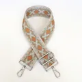 Close-up of geometric pattern jacquard canvas bag strap with silver metal swivel hooks - Pattern B14 + Silver Hardware