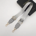 Adjustable grey nylon shoulder strap with golden metal clasps and Fashion & Classic text - Gunmetal Hook / Grey + Grey Leather