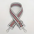 Detail view of woven ethnic shoulder strap with black, white, red pattern and silver hooks - White Black Red Geometric Block (B52+Silver Hook)
