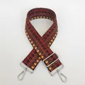 Detail view of woven geometric strap with silver metal swivel hooks and adjustable buckle - Red Brown Black Yellow Multicolor Floral (B53+Silver Hook)