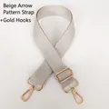 Close-up of beige herringbone woven bag strap with adjustable golden metal hooks - Beige Herringbone & Gold Hook