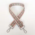 Close-up of pink and green geometric weave canvas bag strap with silver metal swivel hooks - Pink Green + Silver Hooks